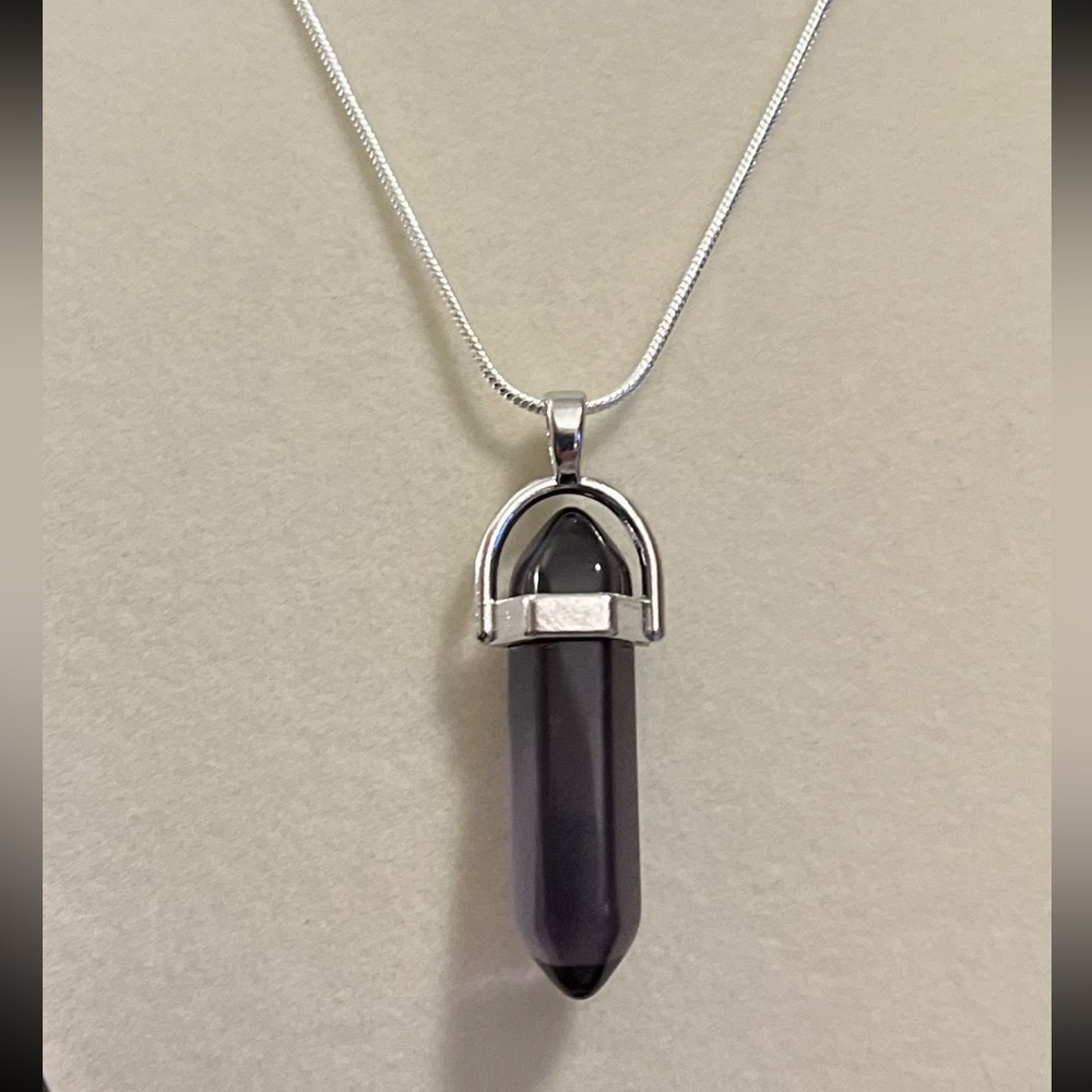 Black Crystal Pendant on a 925 Sterling Silver 16” Snake Chain. Very cute!